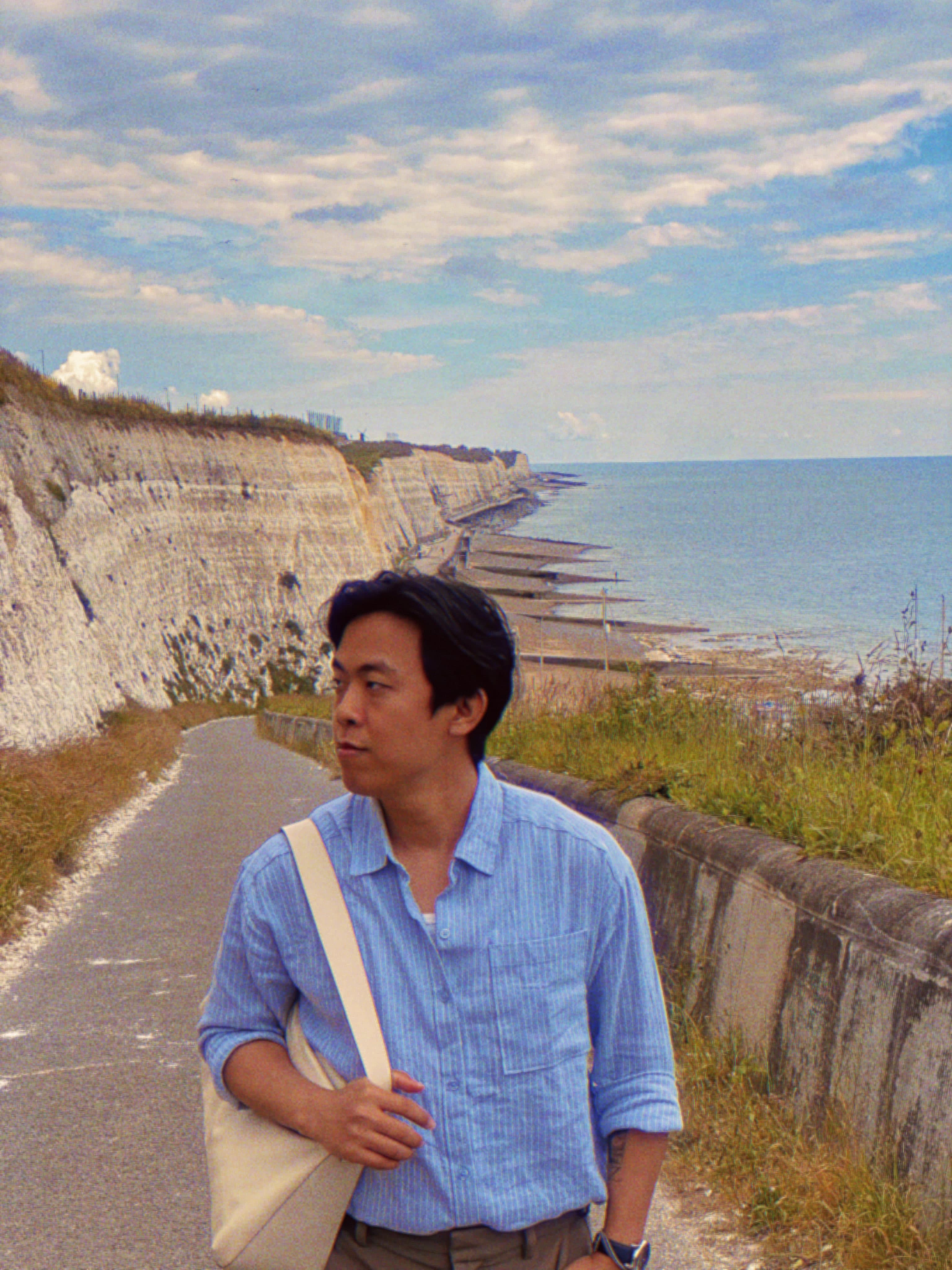 Portrait-style studio image for the personal frame